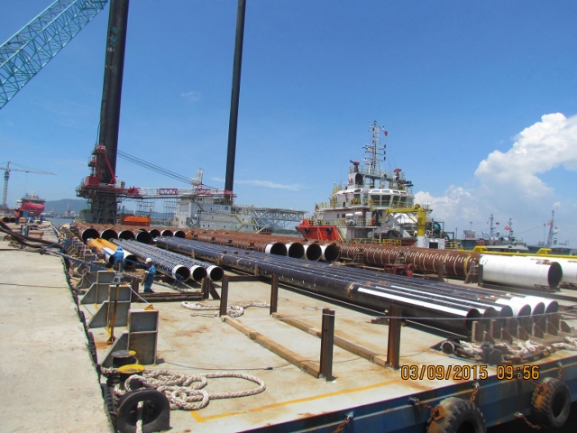 Provide manpower, transportation, equipment and port services for loading out, transporting 1828 tons of jacket piles from fabrication yard onto Barge. - Contract No.: DXP-Q-058